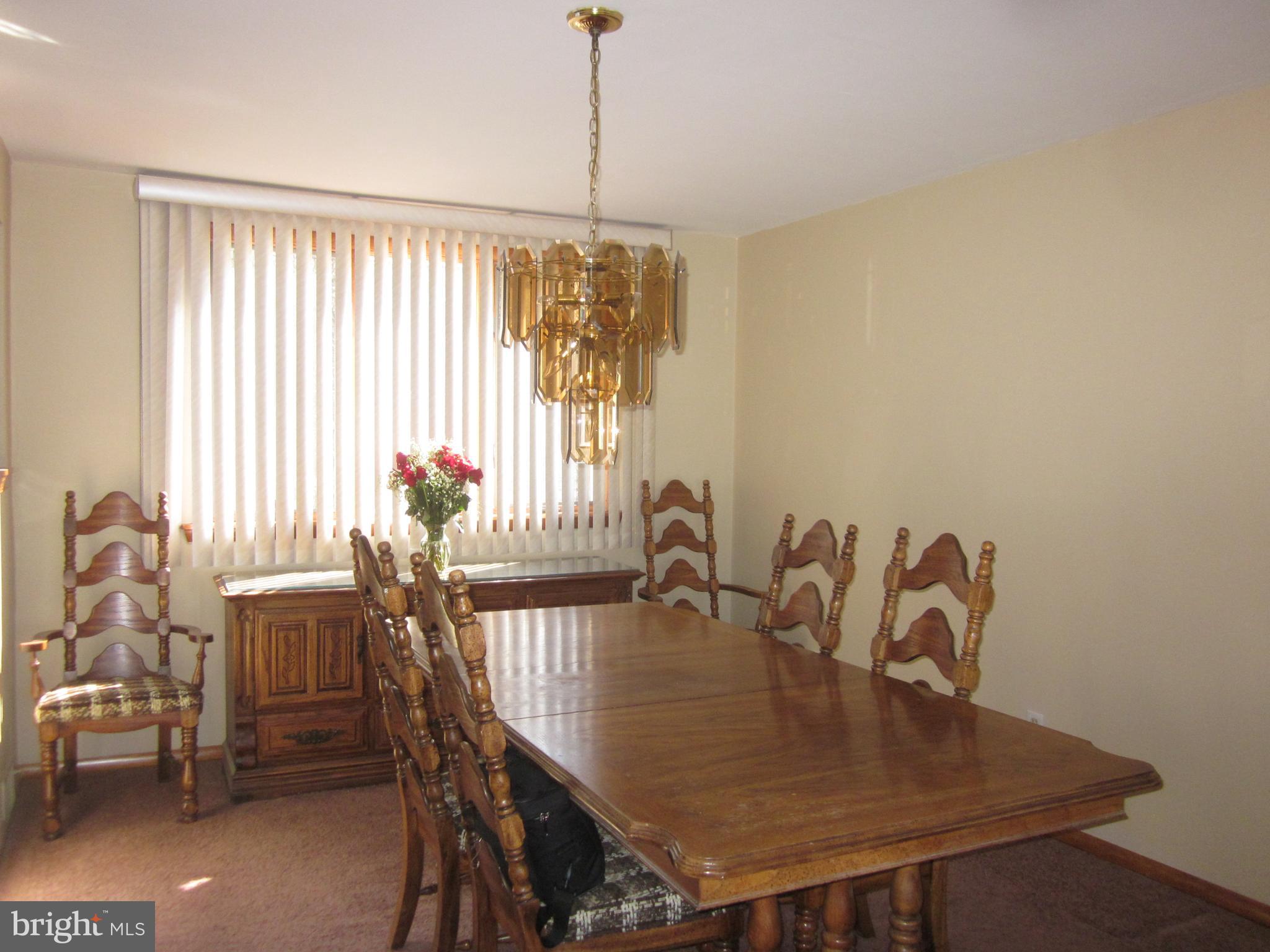11605 Stevens Road Philadelphia, PA 19116 - Photo 10 of 44 a view of a dining room with furniture and window