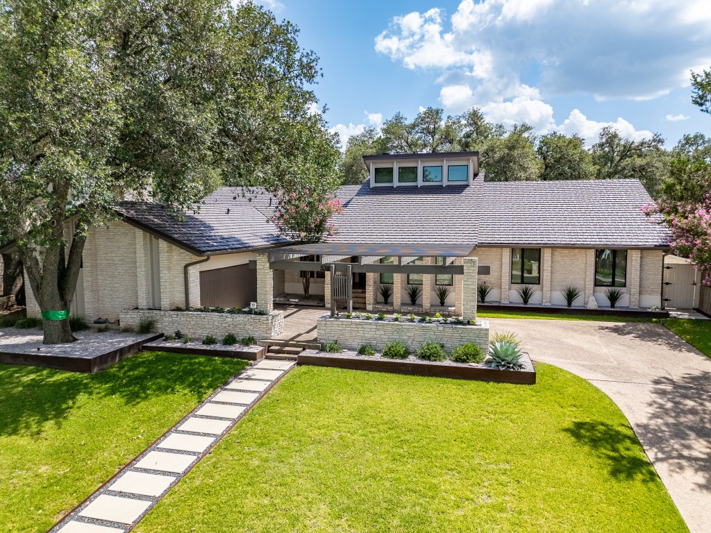 Undisclosed Address Austin, TX 78731 - Photo 1 of 1 a view of a house with pool and sitting area