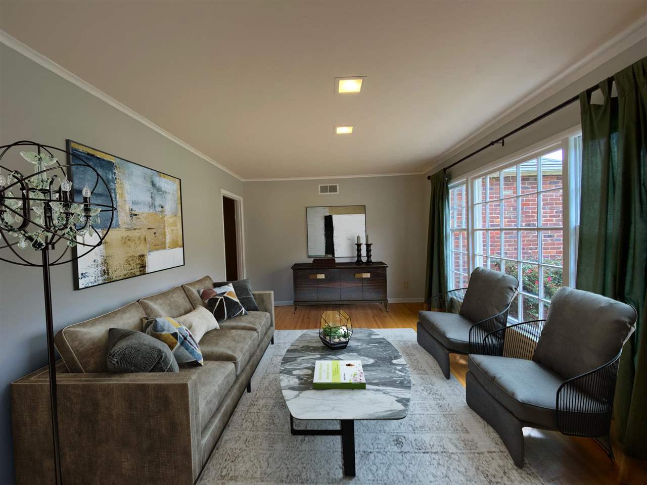5588 Milford Road Memphis, TN 38120 - Photo 3 of 15 a living room with furniture and a window