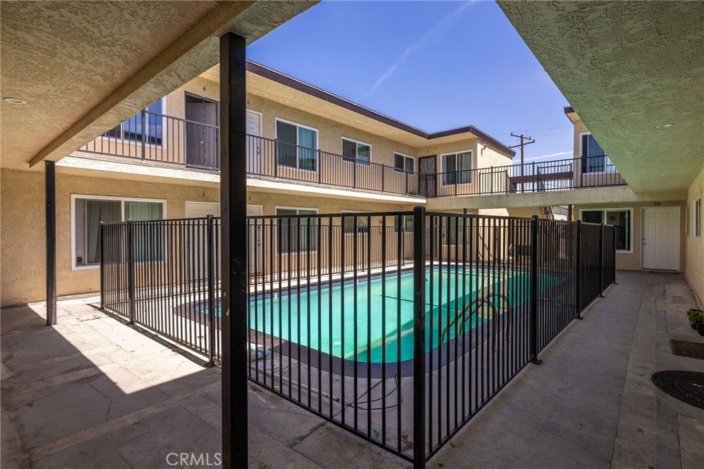 7370 Neo Street Downey, CA 90241 - Photo 12 of 38 a view of a brick house with large windows