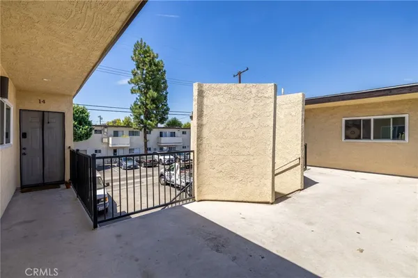 a view of a porch with wooden floor