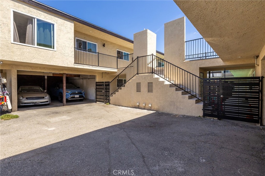 7370 Neo Street Downey, CA 90241 - Photo 16 of 38 a view of a house with a yard