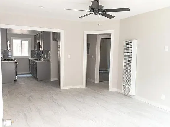 a view of a kitchen with a sink cabinets and window
