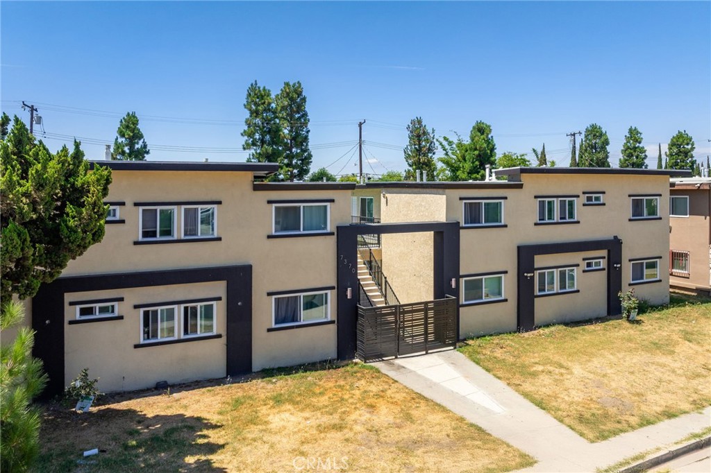 7370 Neo Street Downey, CA 90241 - Photo 5 of 38 a house view with a outdoor space