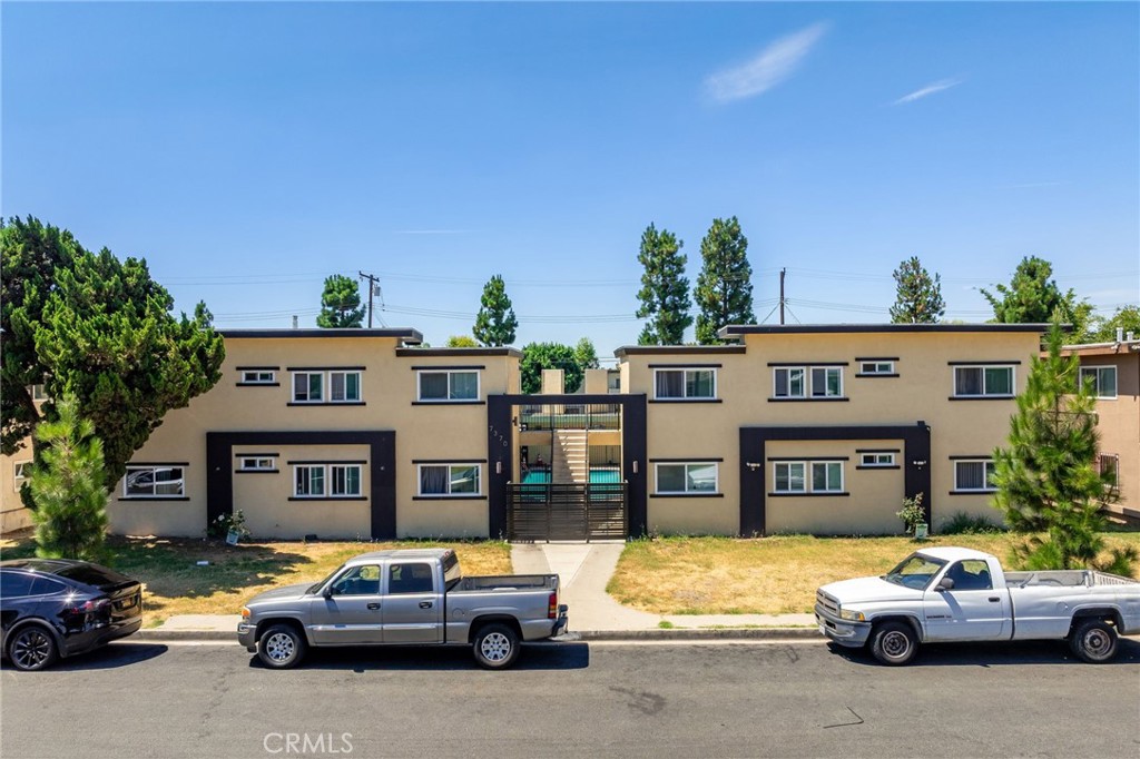 7370 Neo Street Downey, CA 90241 - Photo 6 of 38 a view of a car parked in front of a building