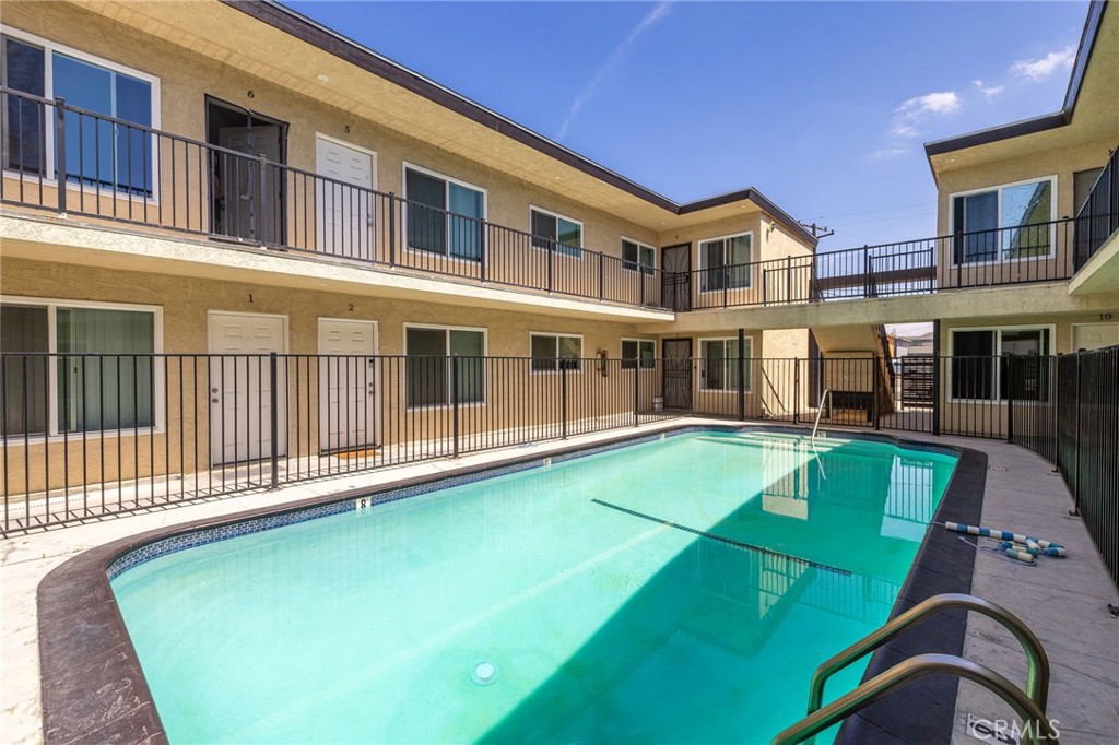 7370 Neo Street Downey, CA 90241 - Photo 10 of 38 a view of an apartment with a swimming pool