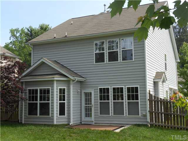 3414 Ranbir Drive Durham, NC 27713 - Photo 18 of 21 a front view of a house with a garden