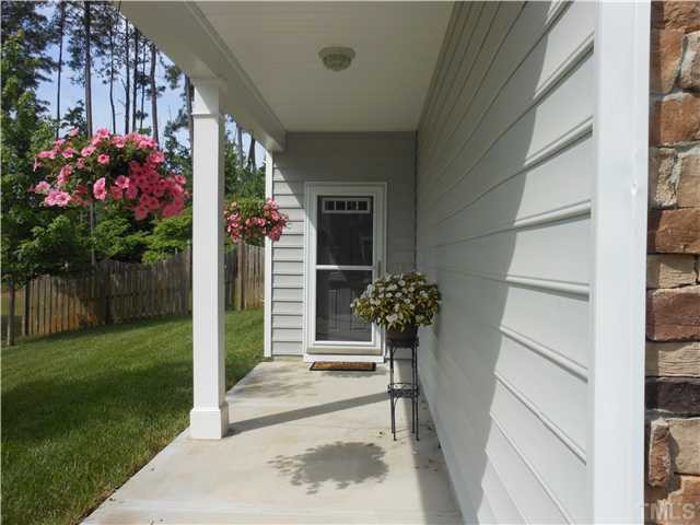 3414 Ranbir Drive Durham, NC 27713 - Photo 2 of 21 a front view of a house with a porch