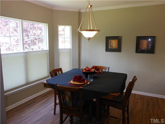 3414 Ranbir Drive Durham, NC 27713 - Photo 3 of 21 a dining room with furniture and window