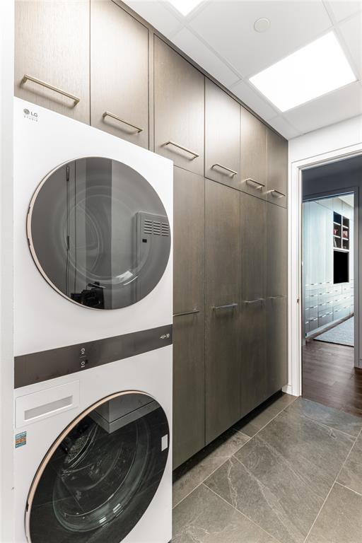 1918 Olive Street, Unit 3403 Dallas, TX 75201 - Photo 20 of 39 a utility room with washer and dryer