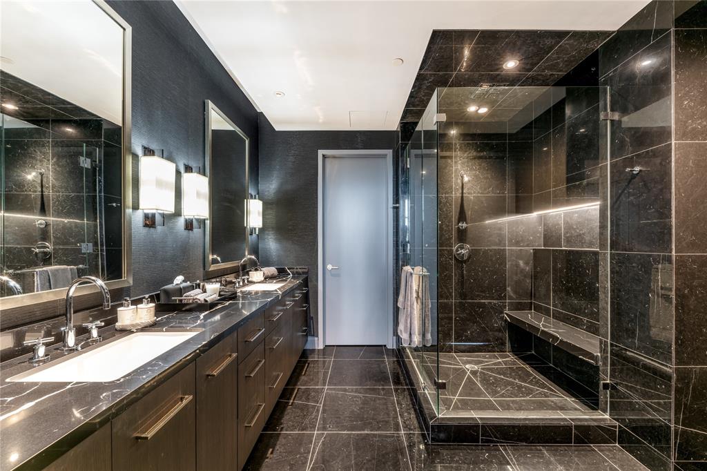 1918 Olive Street, Unit 3403 Dallas, TX 75201 - Photo 25 of 39 a bathroom with double vanity and a mirror