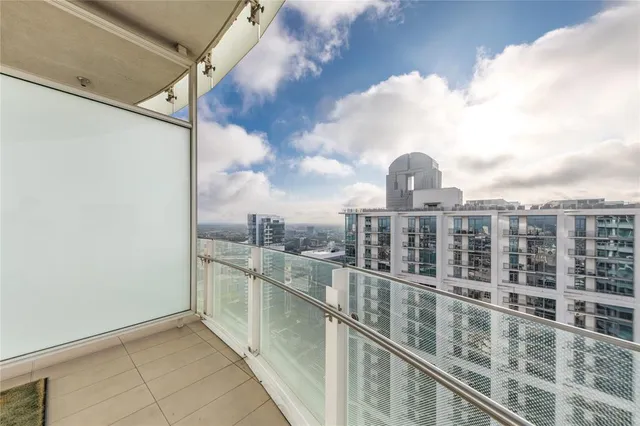 a view of a city with tall buildings