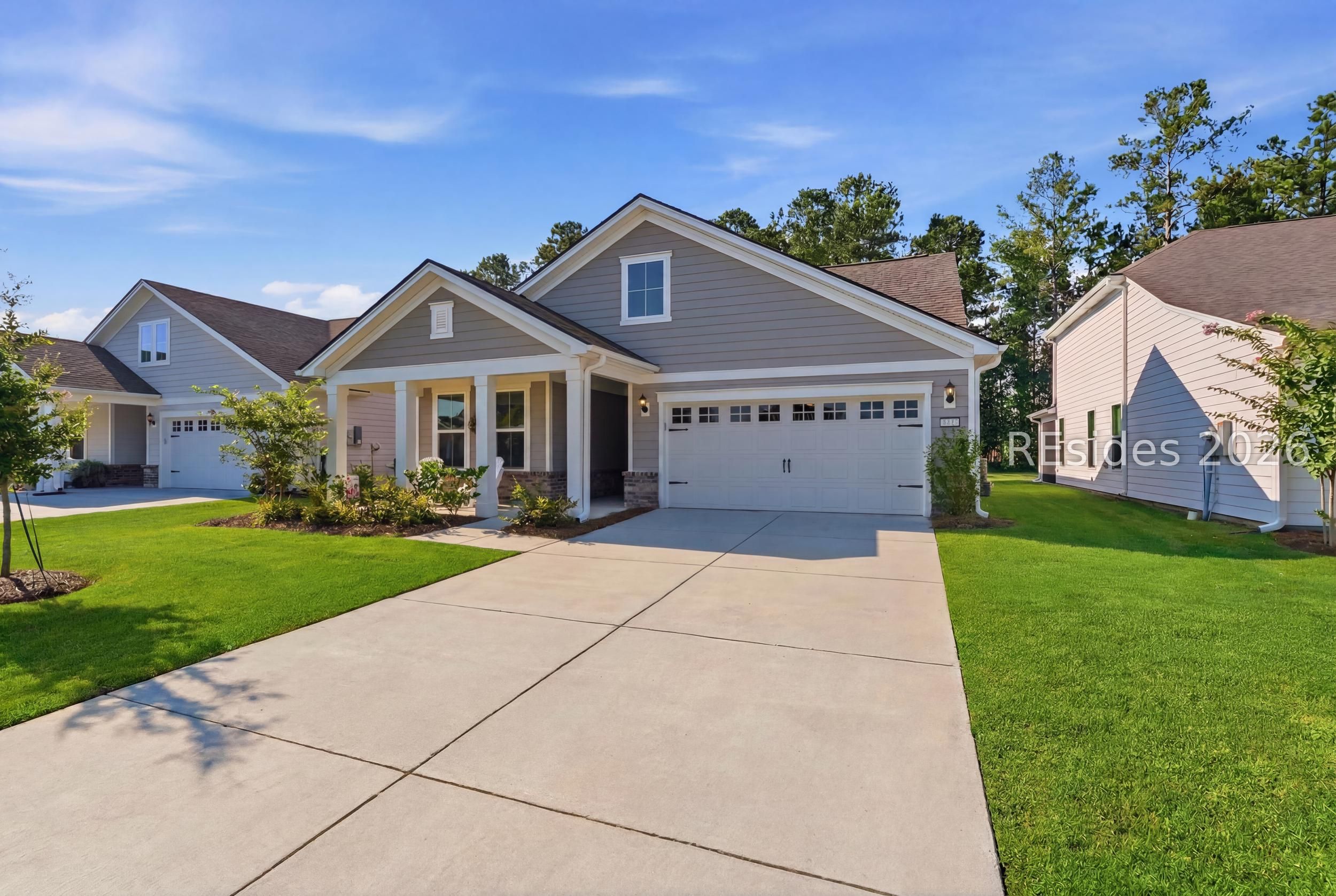 99 Sun Fish Way Hardeeville, SC 29927 - Photo 3 of 80 Longer driveways & sidewalks on the West side