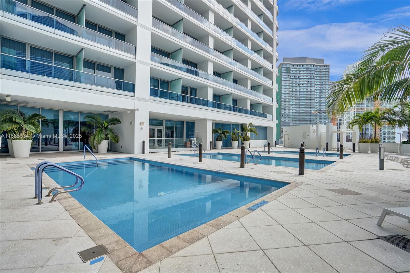 200 Biscayne Blvd Way, Unit 505 Miami, FL 33131 - Photo 28 of 51 a view of building with outdoor seating