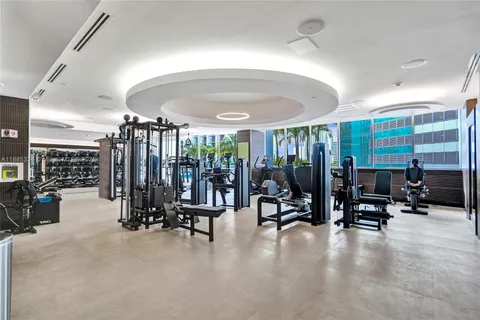 a kitchen with a table and chairs in it