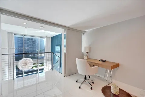 a view of balcony and yard