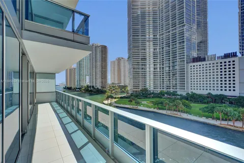 a view of a balcony with chairs
