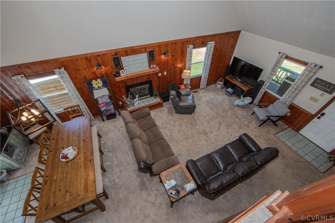 9910 Colemans Lake Road Ford, VA 23850 - Photo 10 of 33 a living room with furniture and a flat screen tv