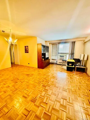 a view of a patio with swimming pool and furniture