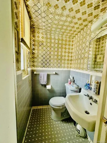 a bathroom with a sink and a toilet