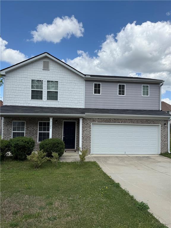 a view of a yard in front of a house
