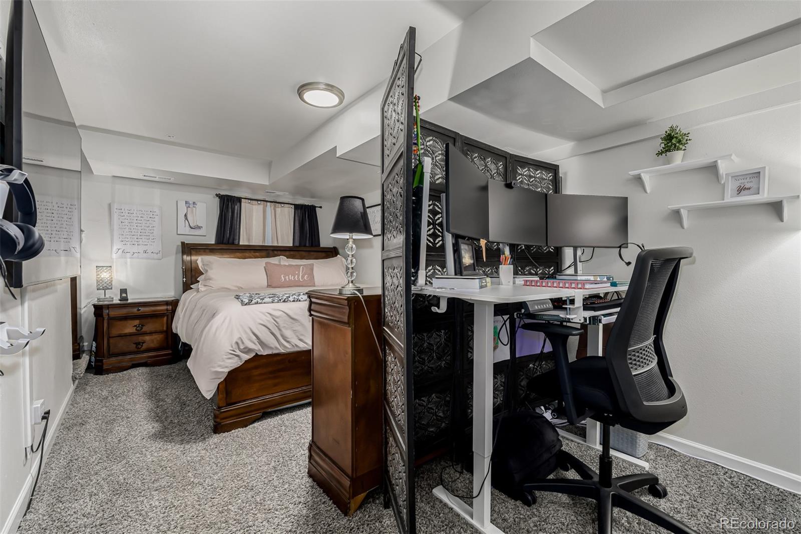 4282 Charleston Drive Colorado Springs, CO 80916 - Photo 22 of 50 a bed room with a bed and furniture