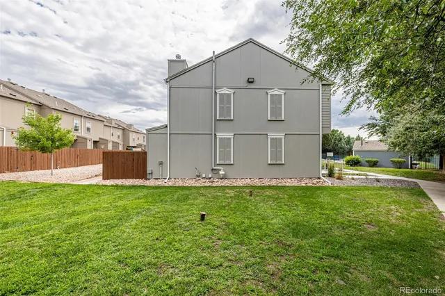 a view of a back yard of the house