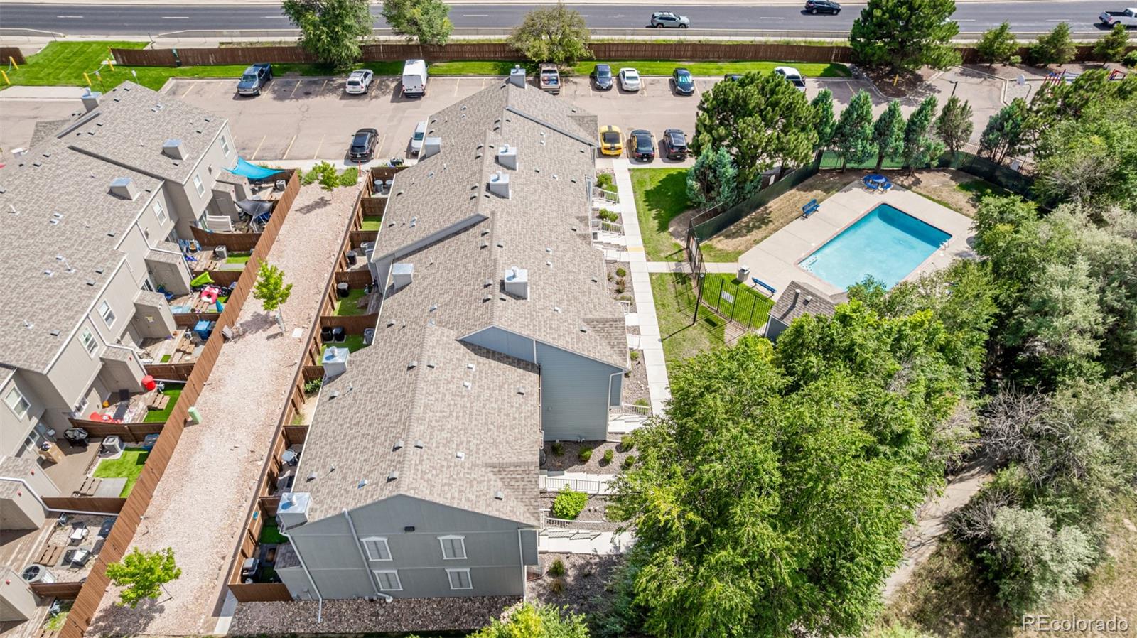 4282 Charleston Drive Colorado Springs, CO 80916 - Photo 42 of 50 an aerial view of a house with a yard and lake view