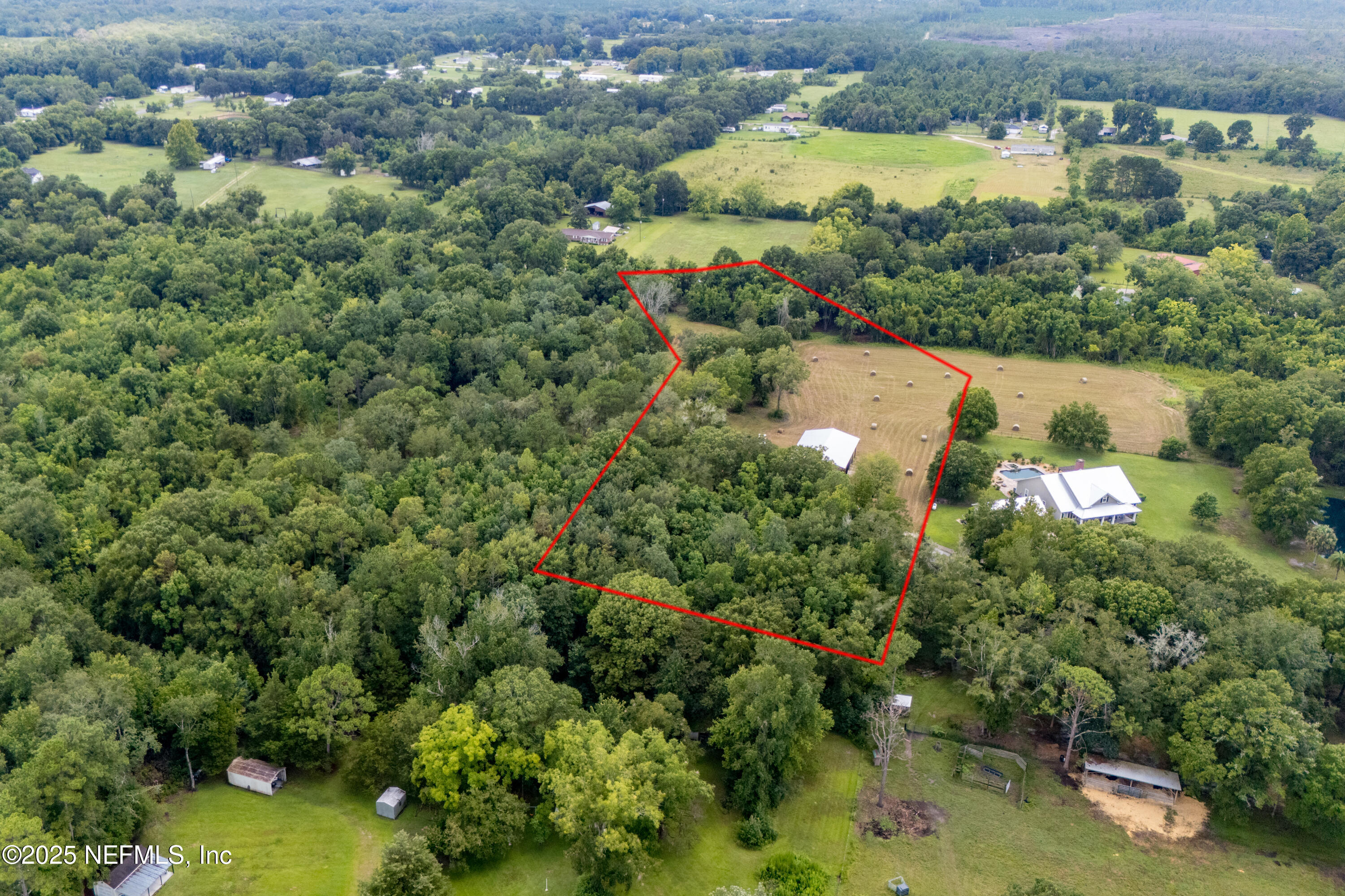 Tbd Northwest 185th Street Starke, FL 32091 - Photo 7 of 9 an aerial view of a houses with yard
