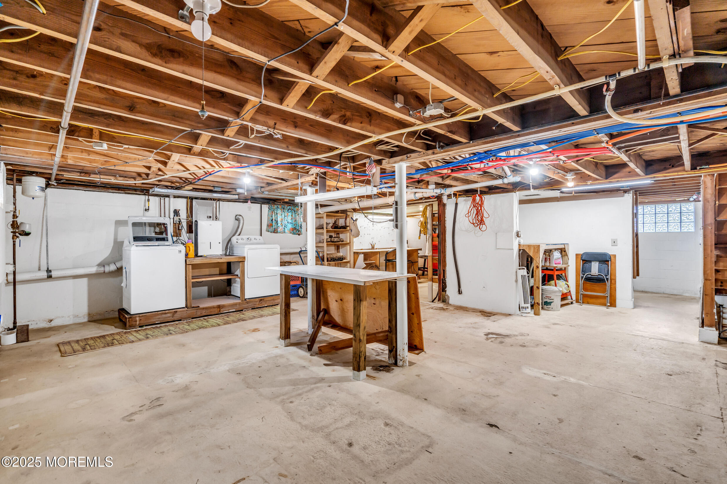 615 Riverside Drive Bayville, NJ 08721 - Photo 17 of 25 a view of a garage with furniture