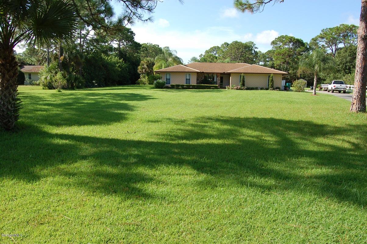 4541 Mustang Road Melbourne, FL 32934 - Photo 1 of 61 front view 2