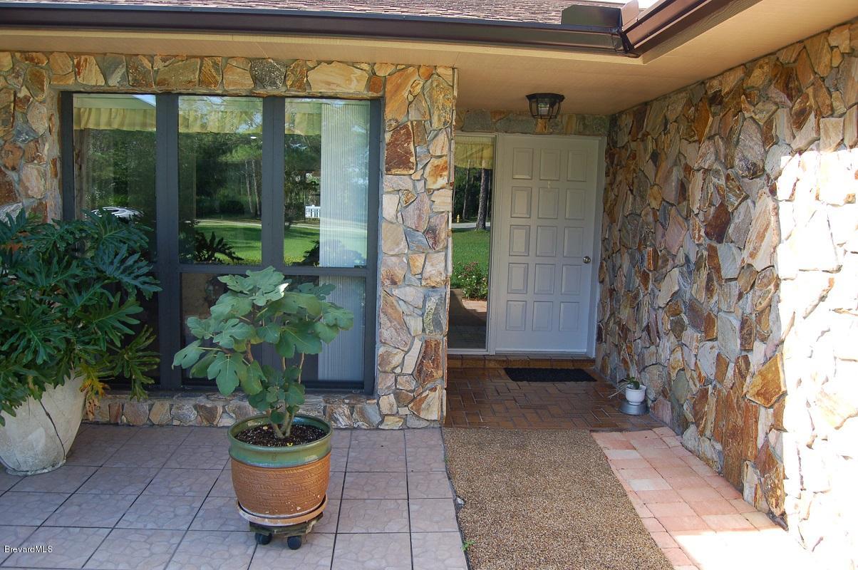 4541 Mustang Road Melbourne, FL 32934 - Photo 19 of 61 front entry1