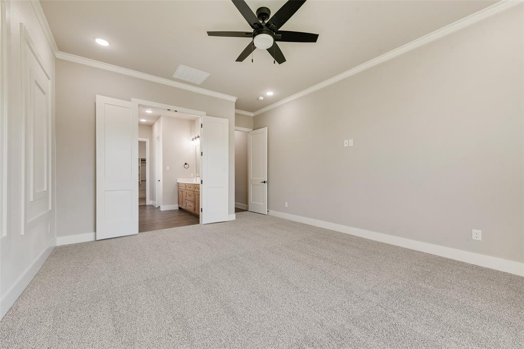 1323 Selby Road Van Alstyne, TX 75495 - Photo 22 of 38 an empty room with a ceiling fan and a window
