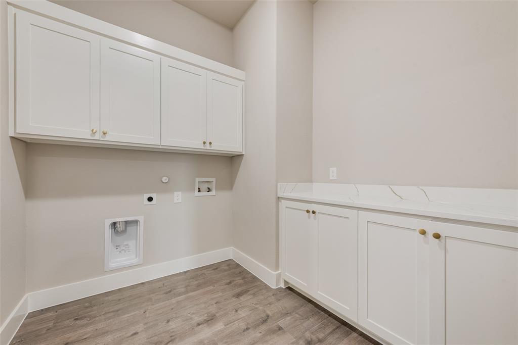 1323 Selby Road Van Alstyne, TX 75495 - Photo 26 of 38 a view of room with cabinets