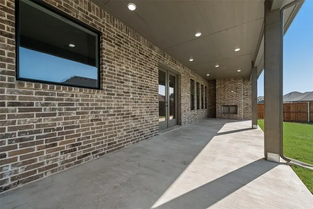 a lobby with a couch and a rug