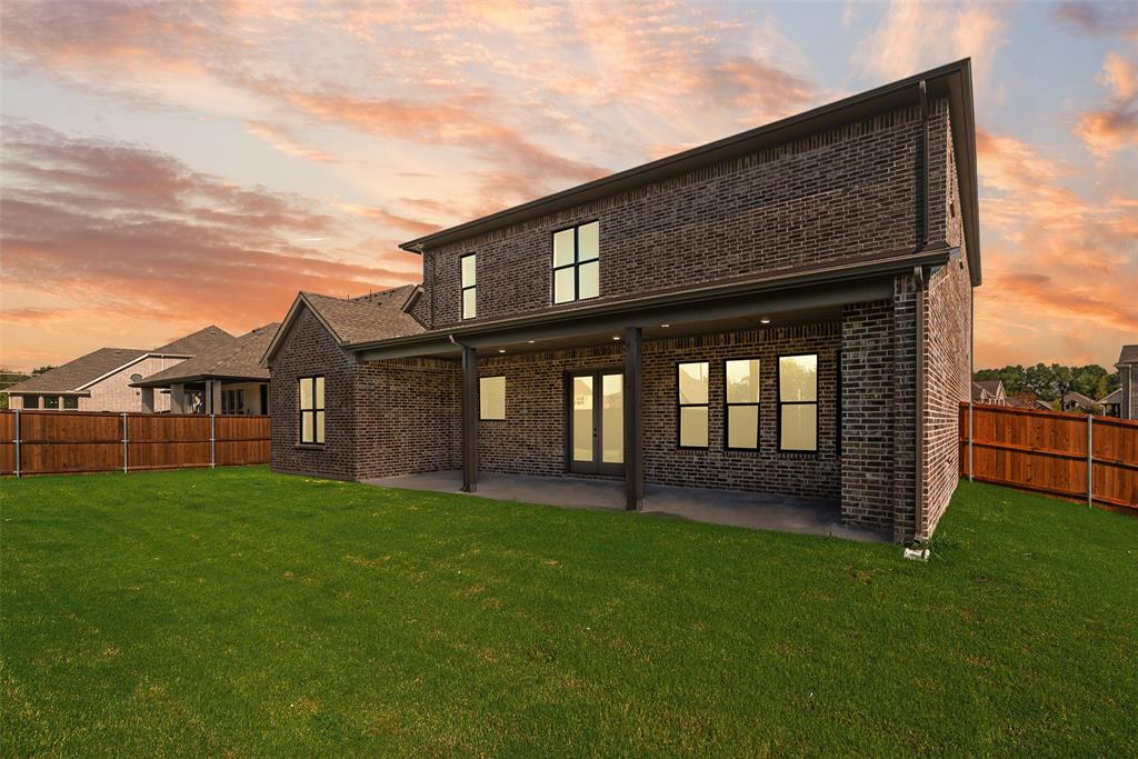 1323 Selby Road Van Alstyne, TX 75495 - Photo 35 of 38 a view of a house with a yard