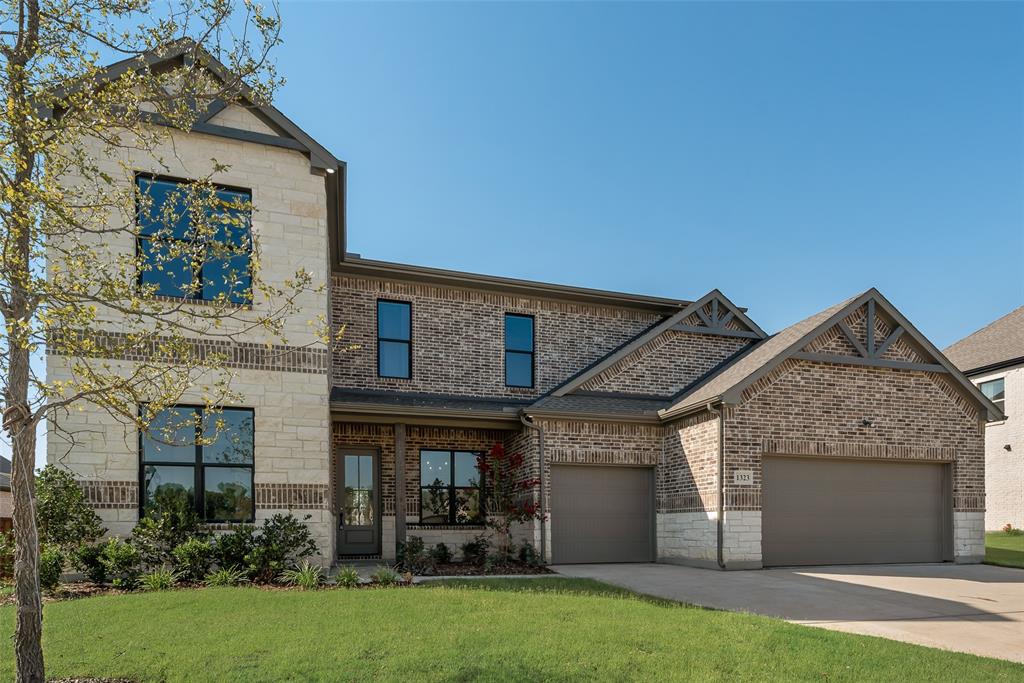 1323 Selby Road Van Alstyne, TX 75495 - Photo 38 of 38 front view of a house with a garden