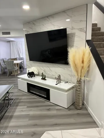 a view living room with flat screen tv and outdoor view