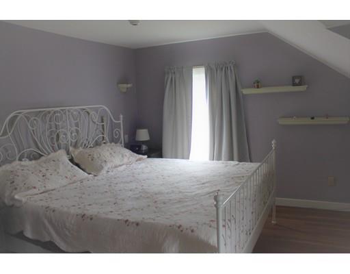 130 Pilgrim Road Weymouth, MA 02191 - Photo 11 of 14 a bedroom with a bed and a window
