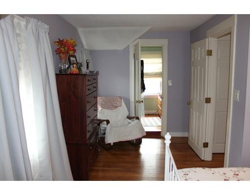 130 Pilgrim Road Weymouth, MA 02191 - Photo 12 of 14 a living room with furniture and a wooden floor