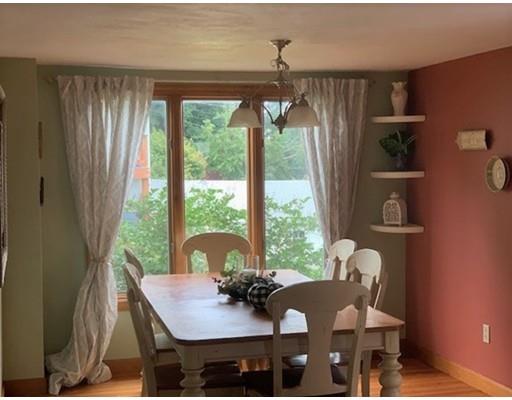 130 Pilgrim Road Weymouth, MA 02191 - Photo 4 of 14 a view of a dining room with furniture window and outside view