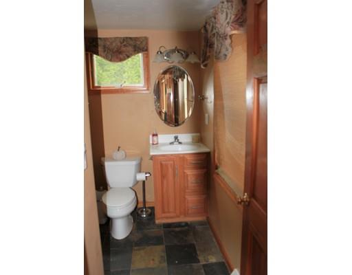130 Pilgrim Road Weymouth, MA 02191 - Photo 7 of 14 a bathroom with a toilet and a sink