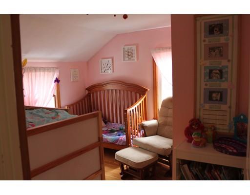 130 Pilgrim Road Weymouth, MA 02191 - Photo 9 of 14 a view of livingroom with furniture and windows