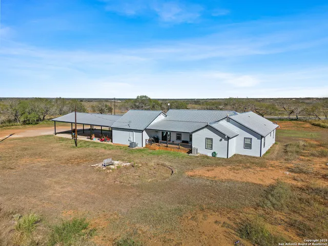 a view of residential houses with city view