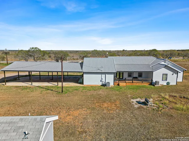 a house view with a garden space