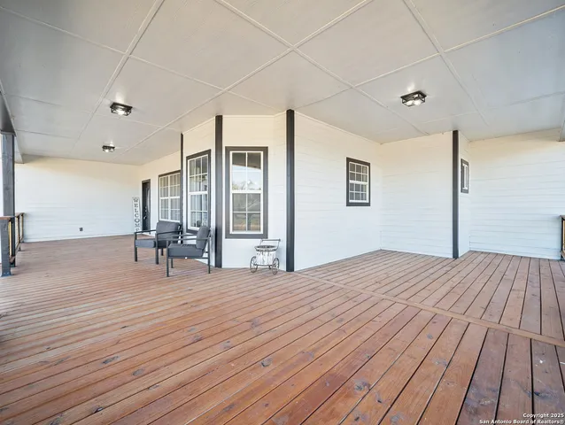 a view of a livingroom with wooden floor