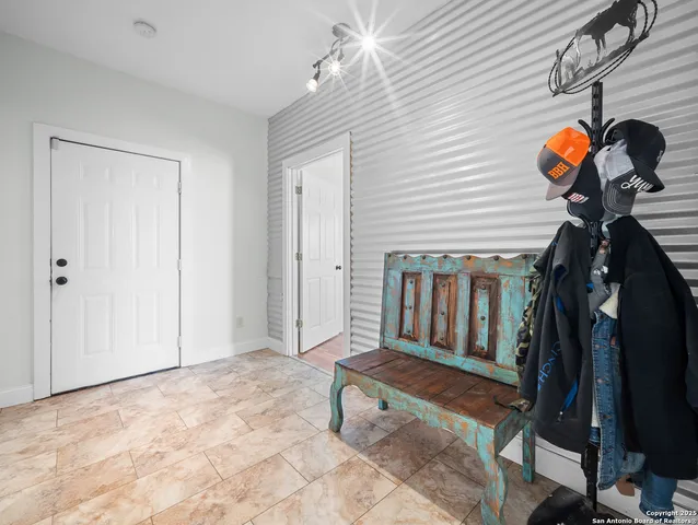 a view of a hallway with painted walls