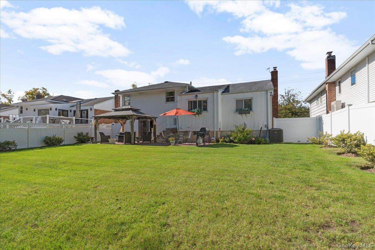 269 Hungry Harbor Road Valley Stream, NY 11581 - Photo 27 of 34 a view of a house with backyard and garden