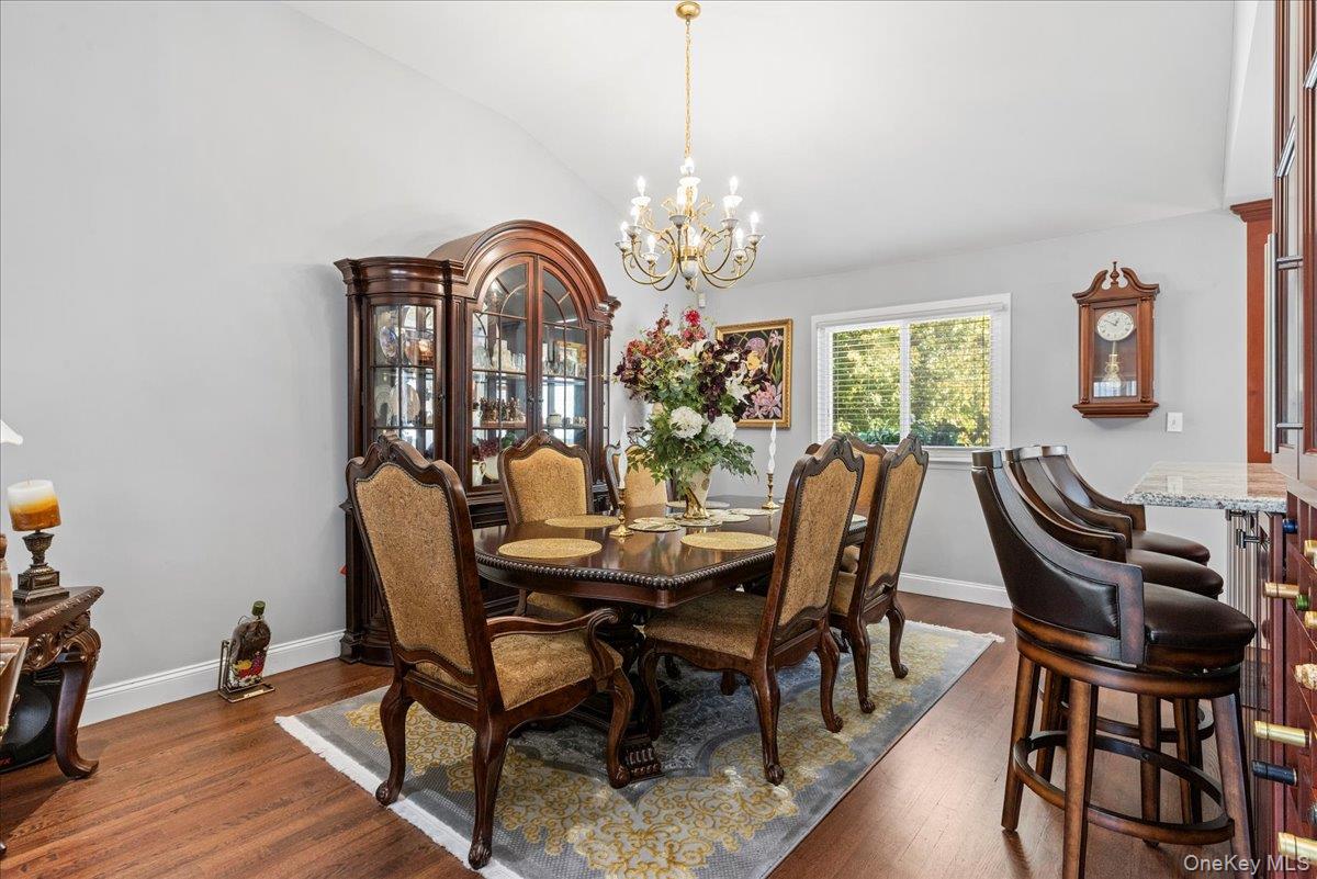 269 Hungry Harbor Road Valley Stream, NY 11581 - Photo 4 of 34 a view of a dining room with furniture and chandelier