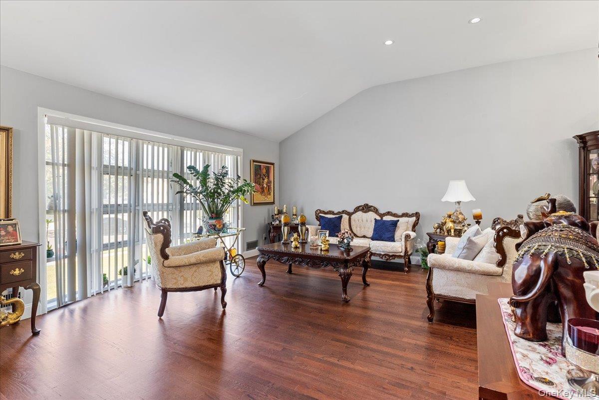 269 Hungry Harbor Road Valley Stream, NY 11581 - Photo 8 of 34 a living room with furniture and a large window
